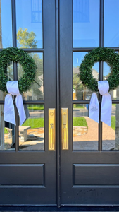 To tie your wreath sash, follow these four steps: Hang your sash
